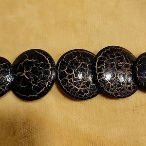 Black and gold textured necklace.